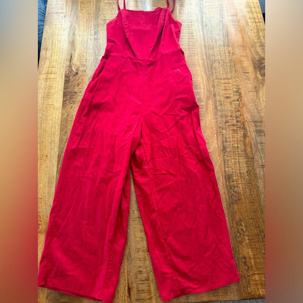 Red colored, tank top jumpsuit. Size S